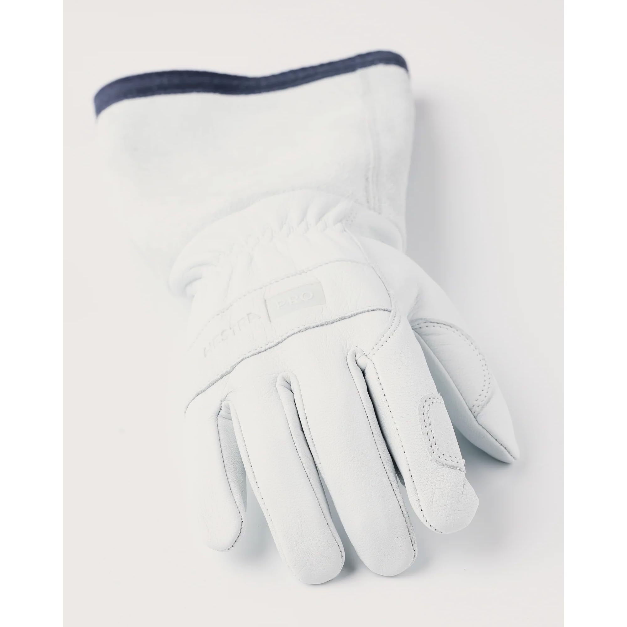 Hestra Job Garden Rose Glove being worn while gardening