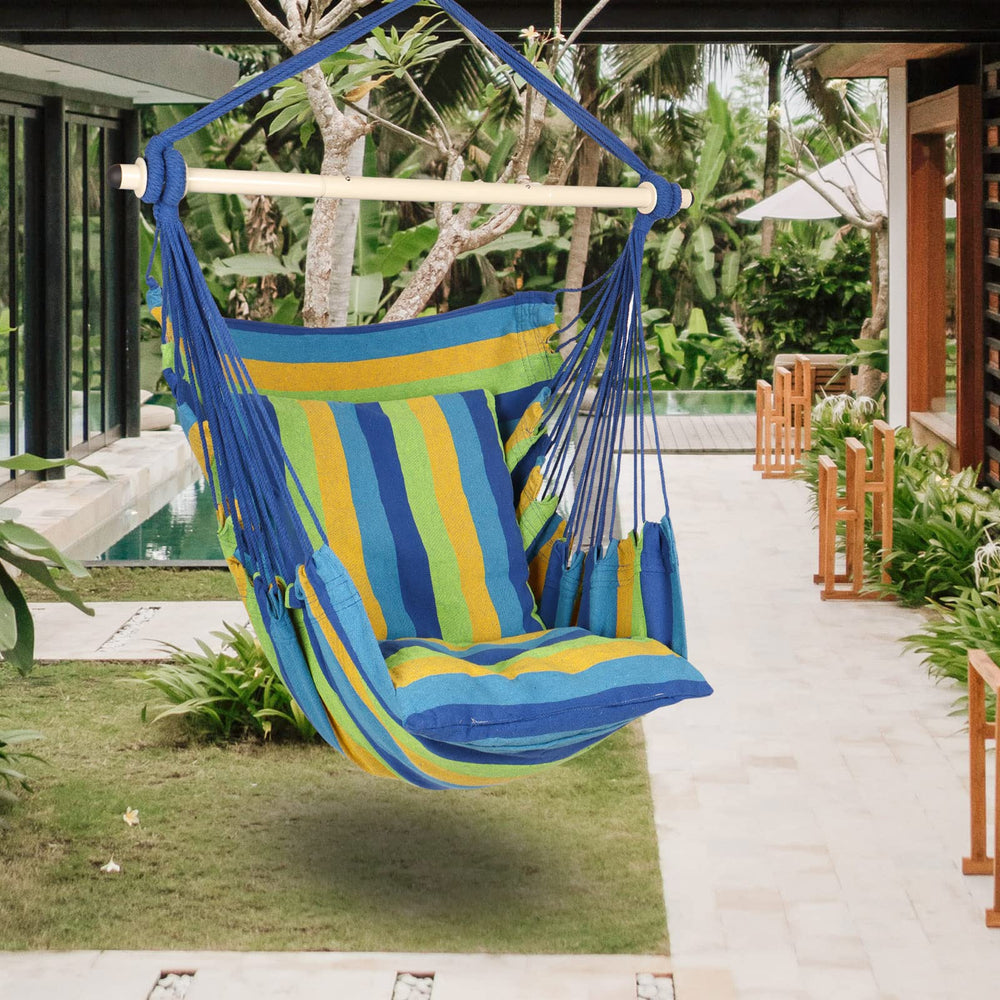 Highwild Hammock Chair Swing with cushions on a patio
