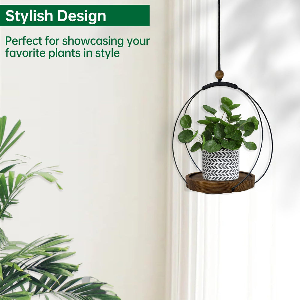hismocal Hanging Planter Black on a window sill showcasing plants