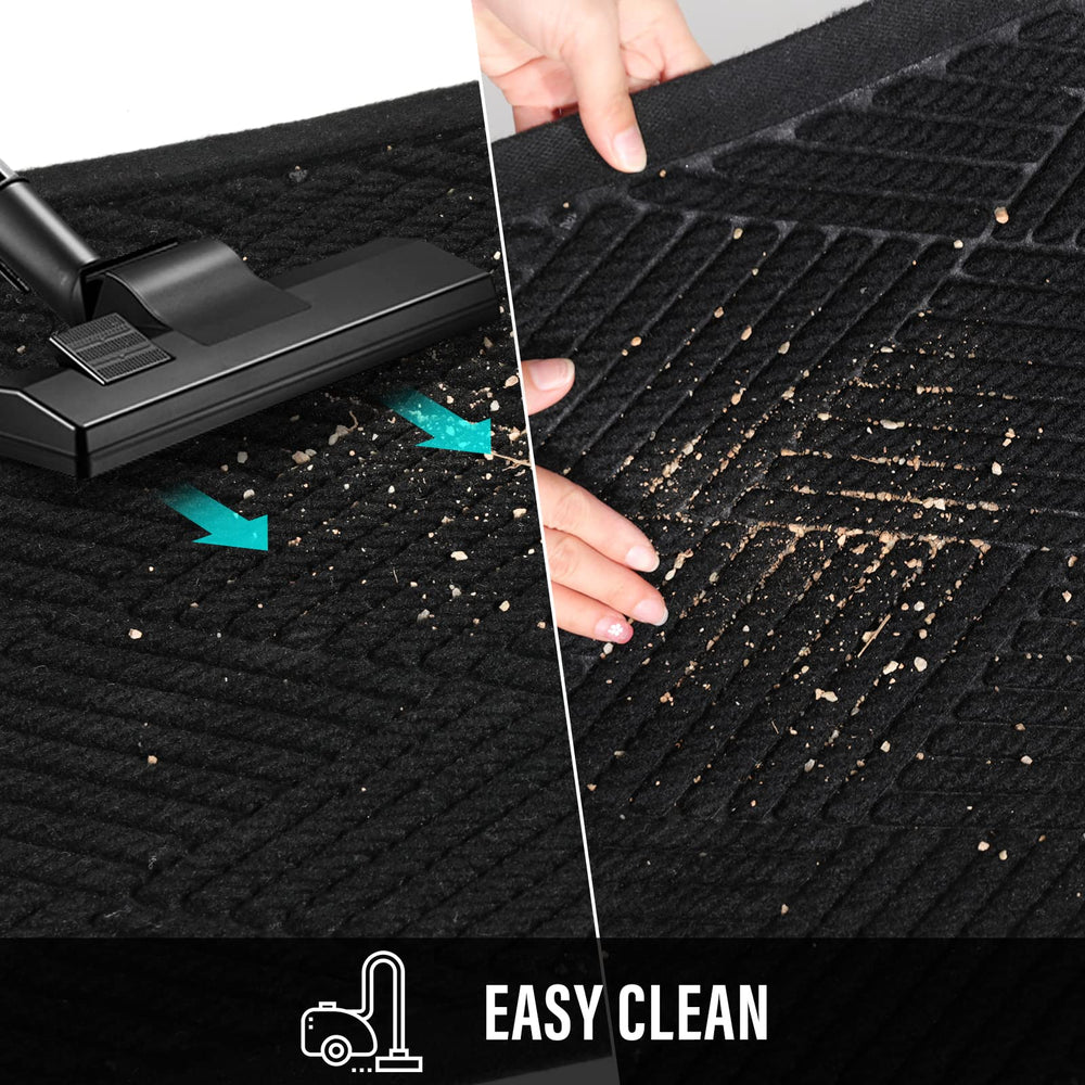 HIYARD front door mat being rinsed with a garden hose