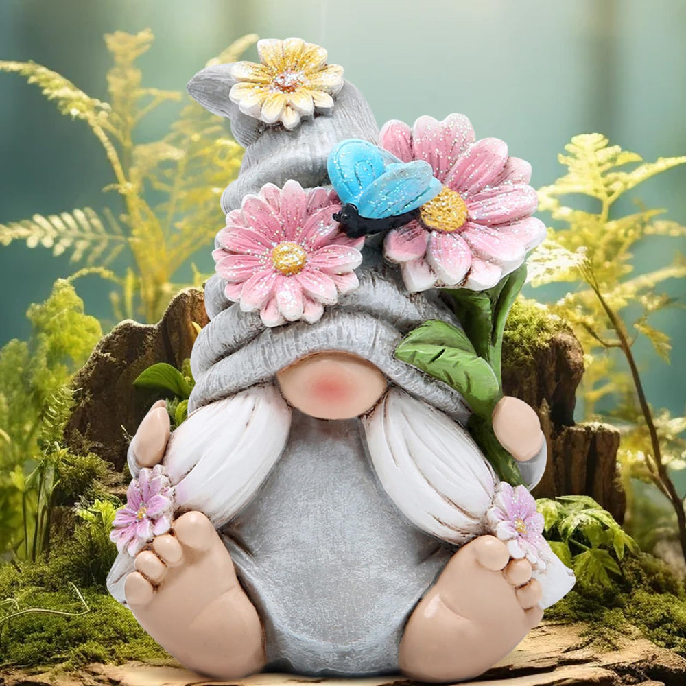 Hodao Spring Gnome Figurine placed in a garden setting