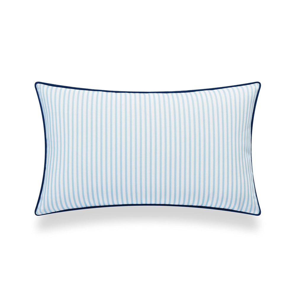 Hofdeco Premium Coastal Lumbar Pillow Cover in a cozy reading nook