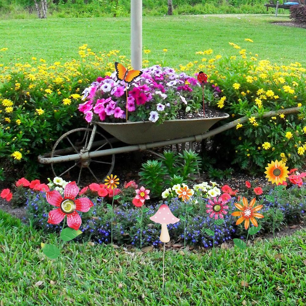 Hogardeck metal flower stakes installed in a lush garden