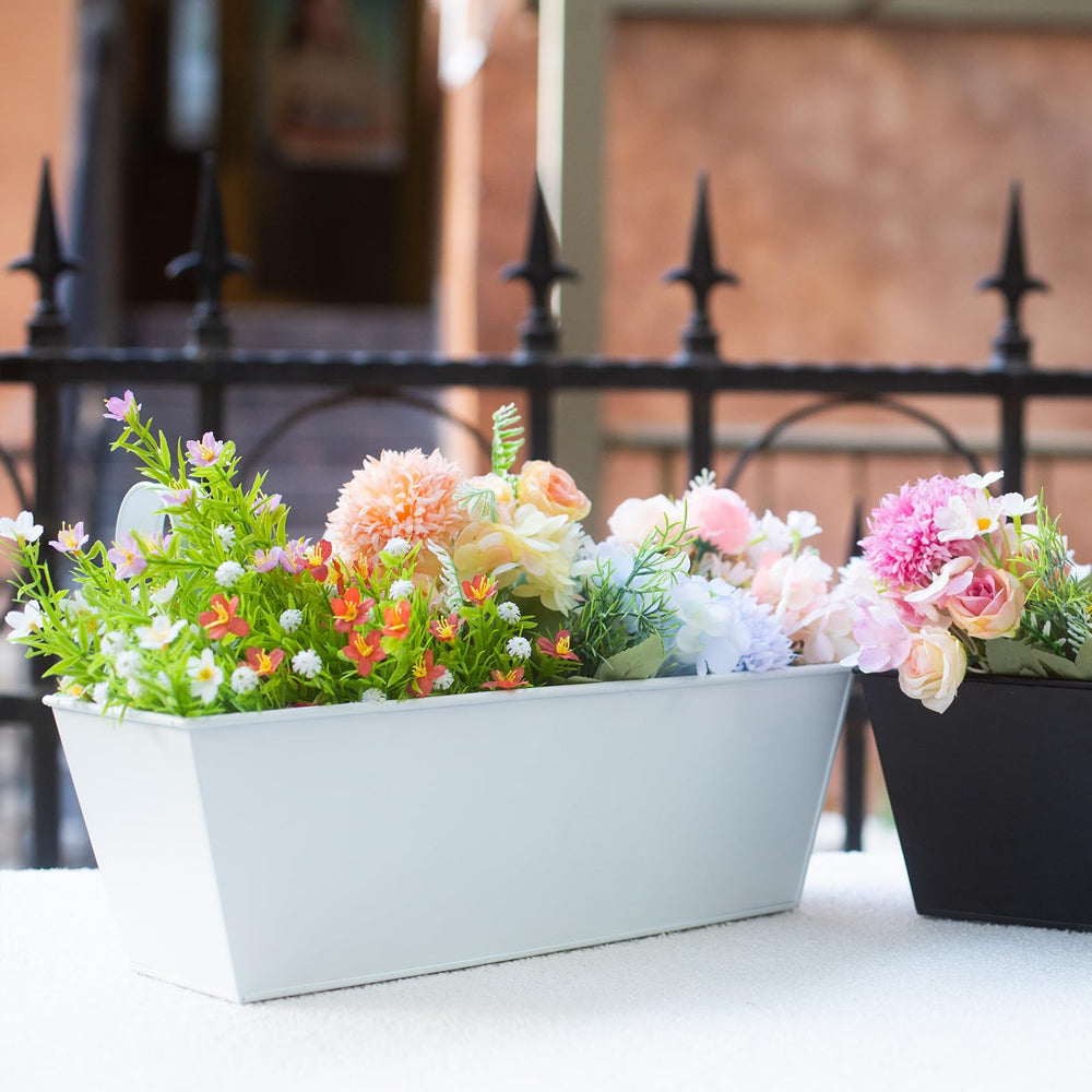 Holensun planter installed on a balcony wall with herbs