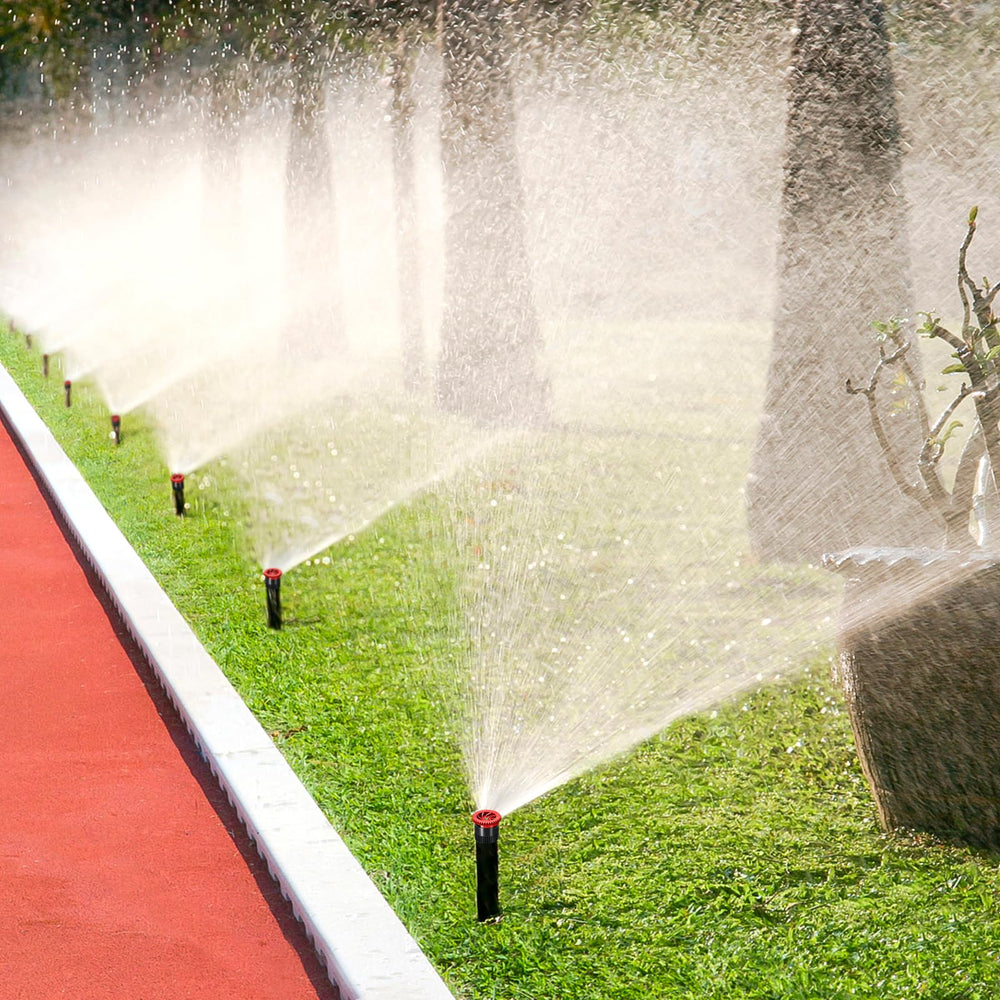HolyMaji nozzles displayed on a garden table, ready for use
