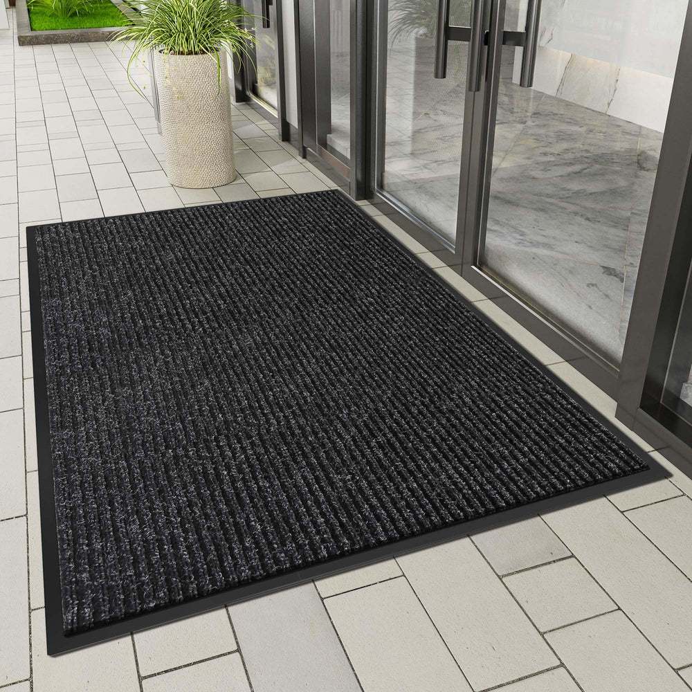 HOMEK door mat showcasing deep grooves for dirt capture