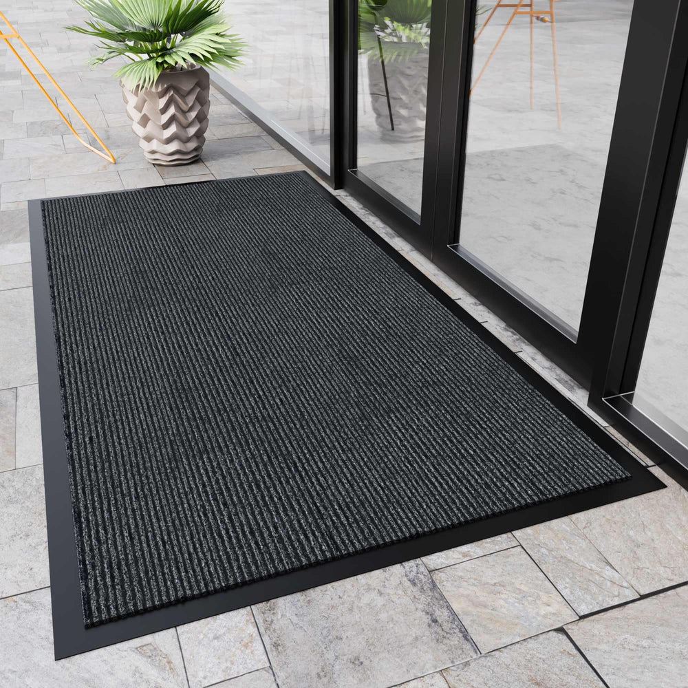 HOMEK door mat showing deep grooves for dirt capture