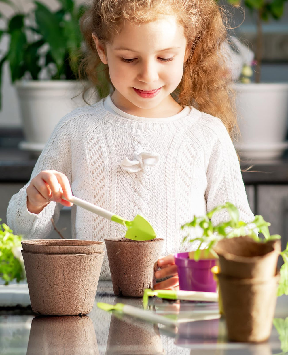HOMENOTE peat pots in a garden setting with seedlings