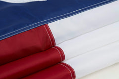 Homissor Texas Flag flying outdoors in the breeze