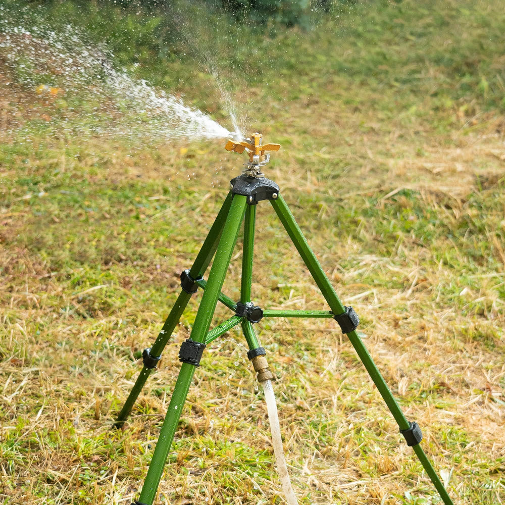 Hourleey impact sprinkler showing coverage area