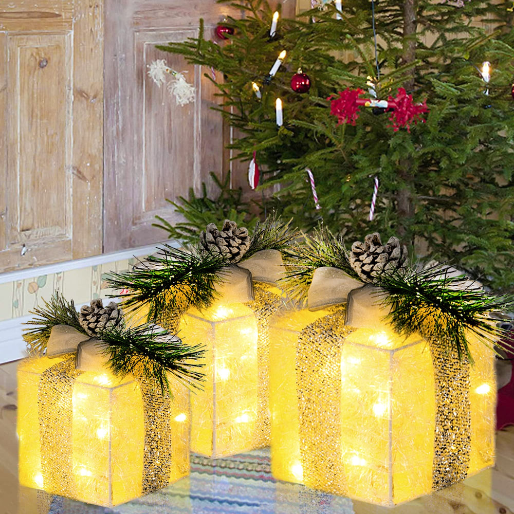 Hourleey lighted gift boxes in an outdoor holiday display