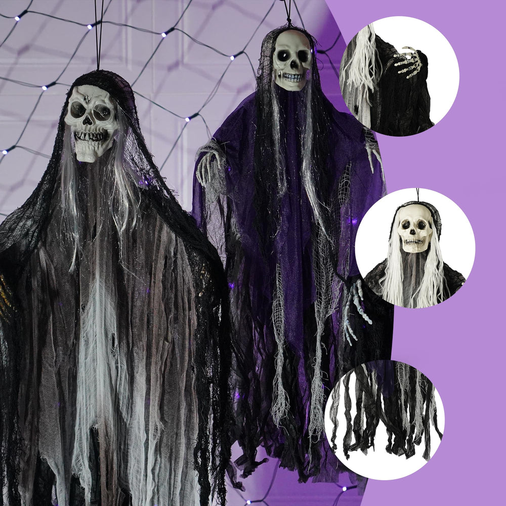 Hourleey skeleton ghosts hanging from a tree