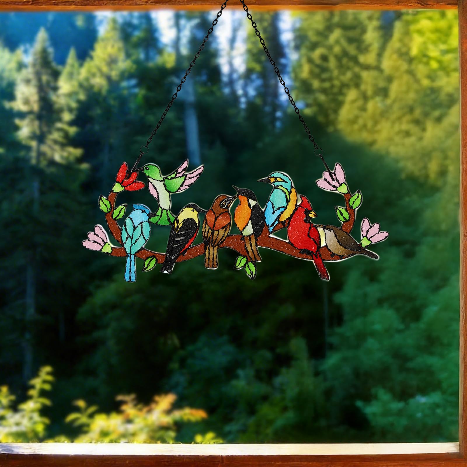 Huray Rayho stained glass sun catcher hanging in a garden setting