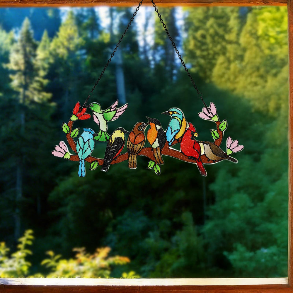 Huray Rayho stained glass sun catcher hanging in a garden setting