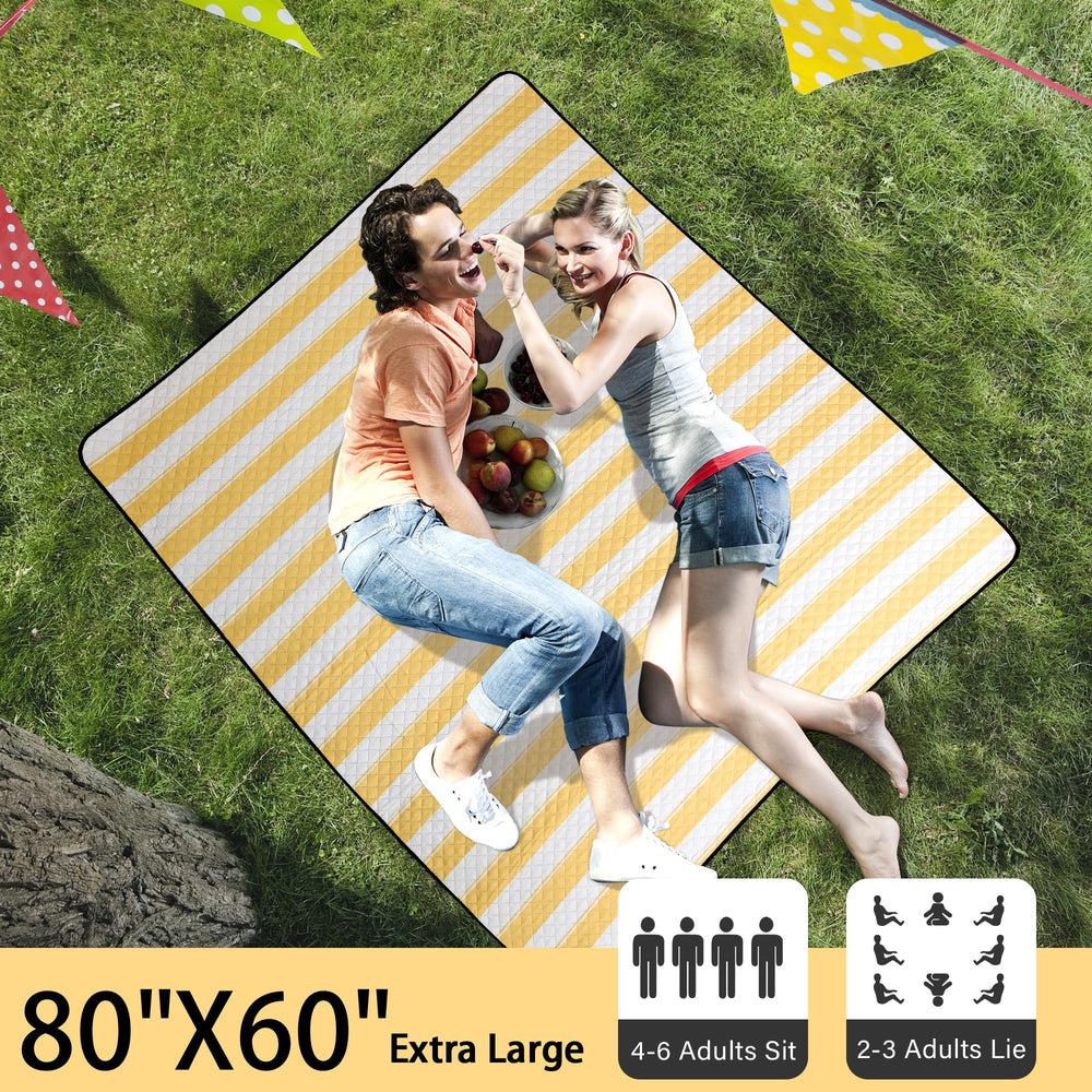 HX&OD picnic blanket spread out on grass