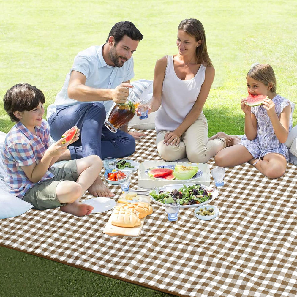 HX&OD picnic blanket with family enjoying outdoors