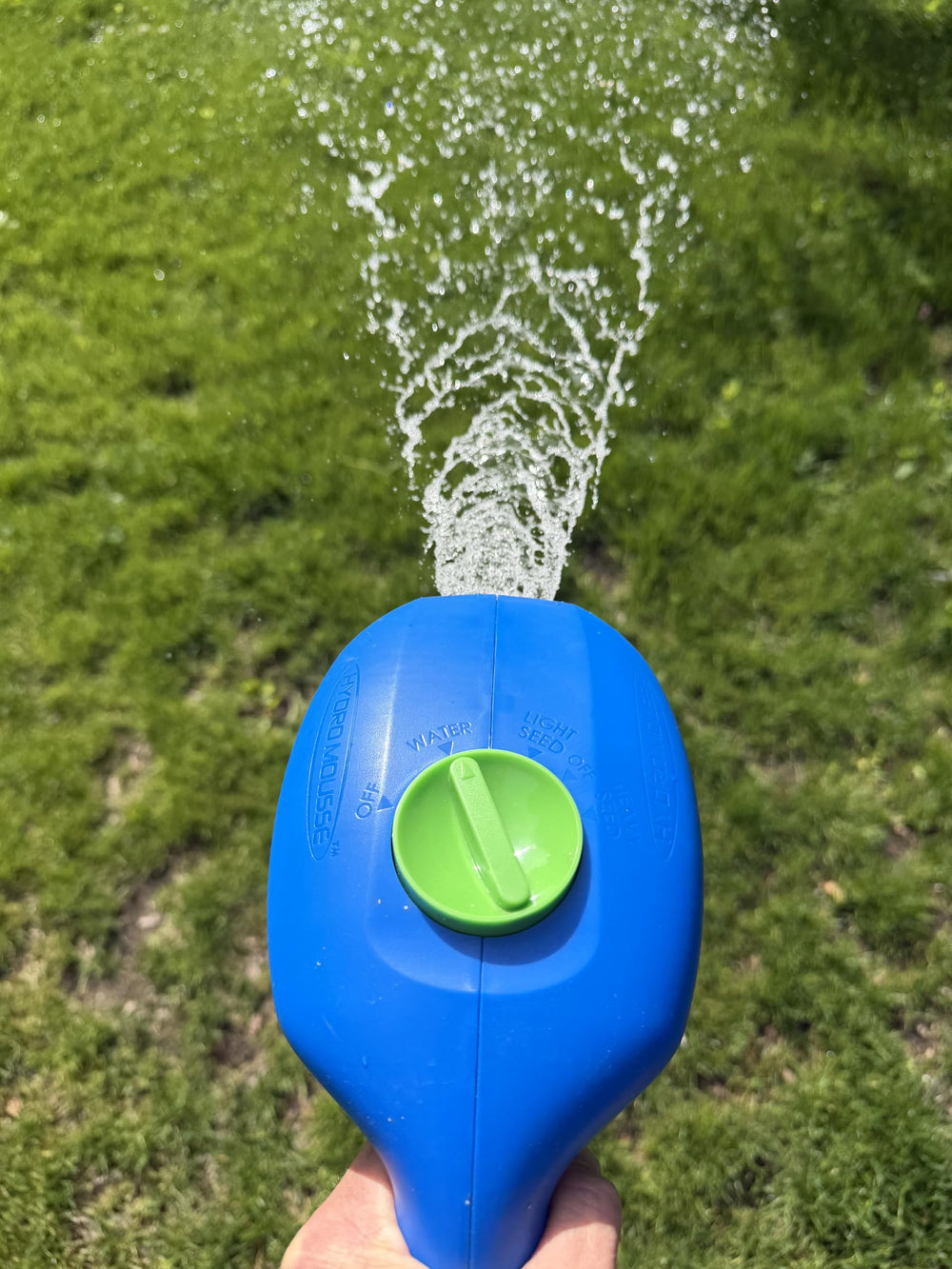 Hydro Mousse kit contents including spray head and grass seed packets