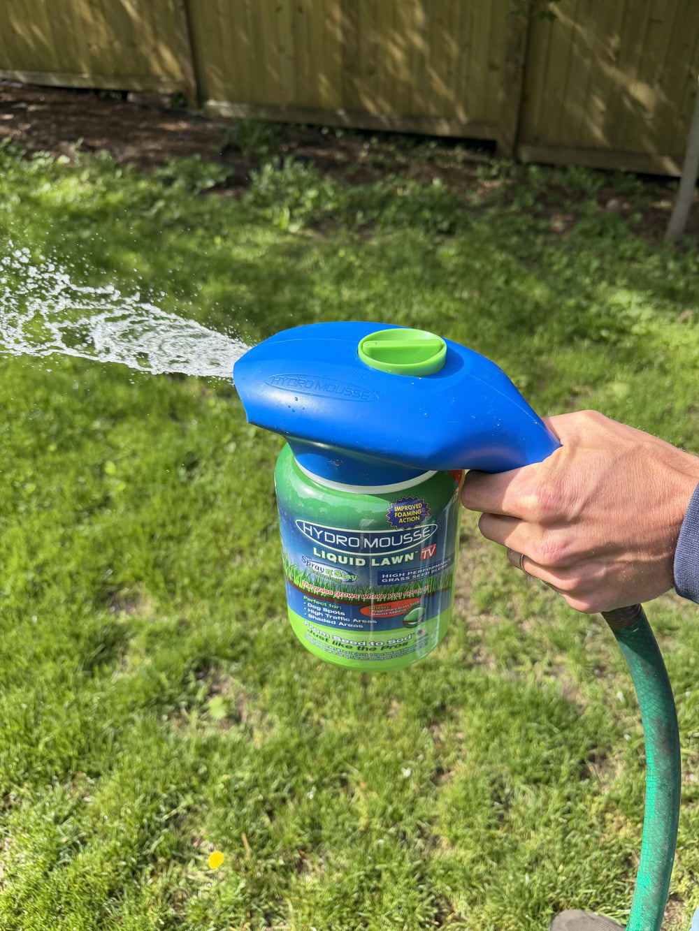 Hydro Mousse Liquid Lawn System application in progress on a lawn