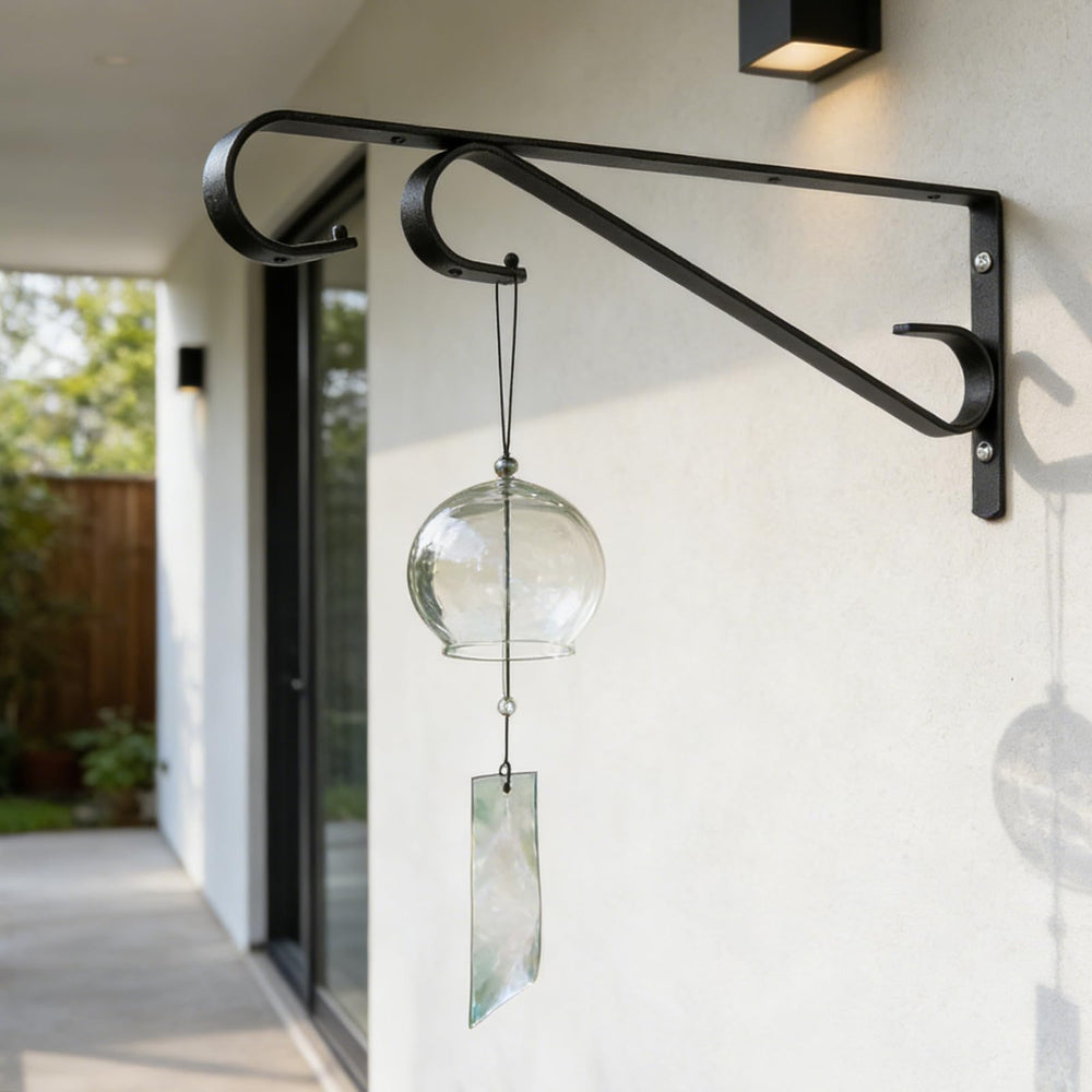 Hystun plant hangers in garden setting with flowers