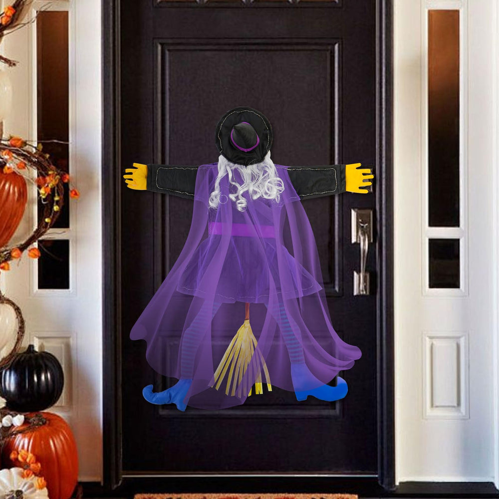 ILLUMINEW Halloween Crashing Witch in daylight showing solar panel