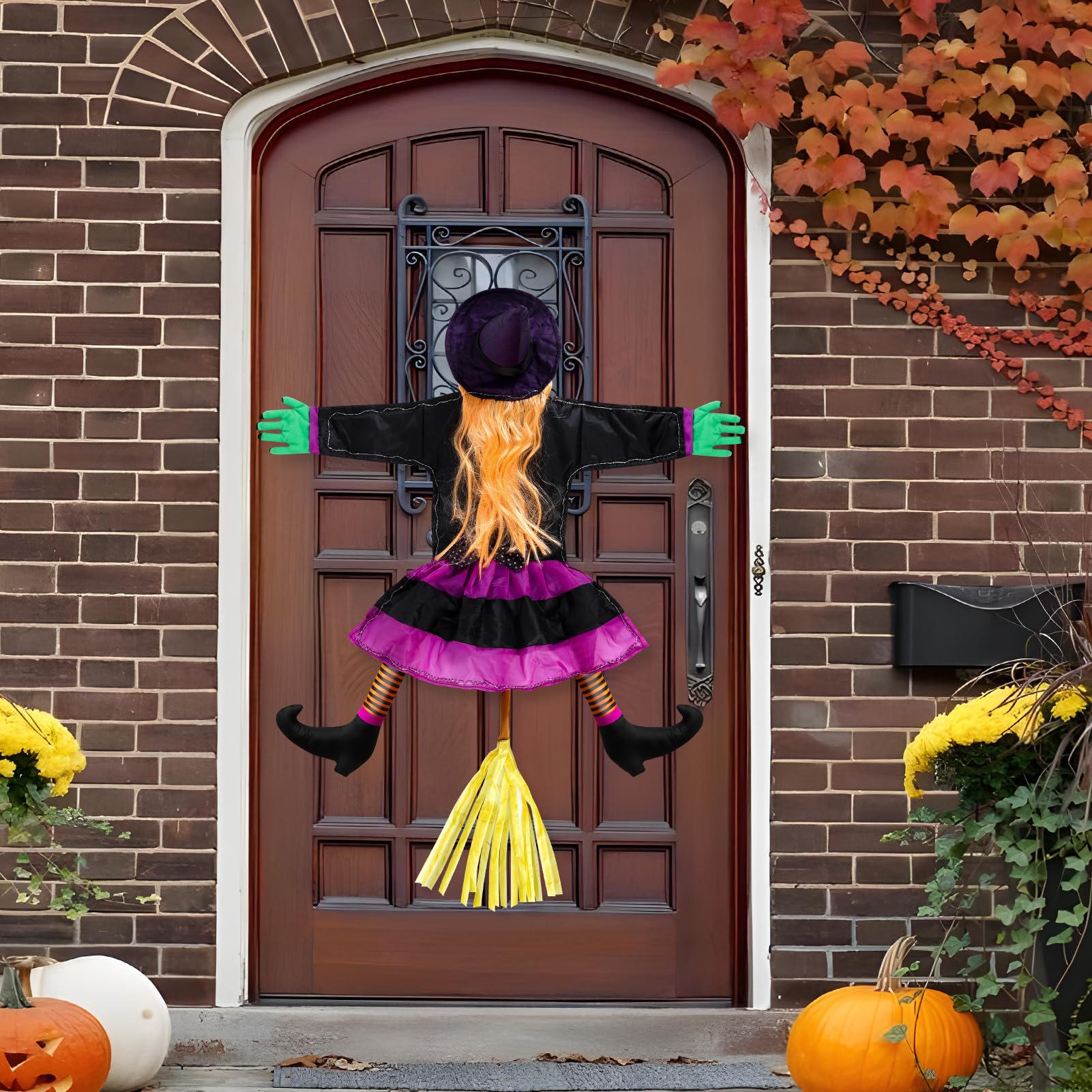 ILLUMINEW Halloween witch with broom in the dark
