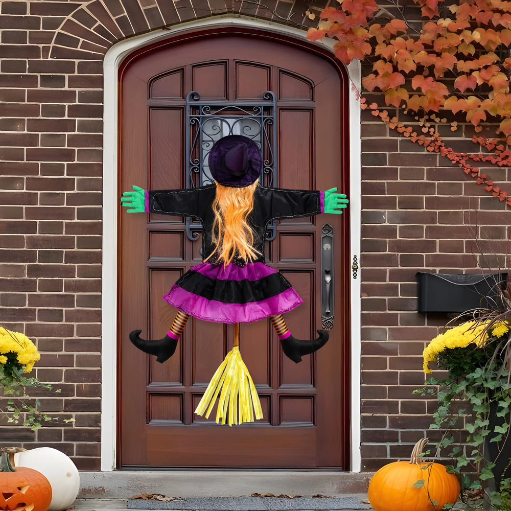ILLUMINEW Halloween witch with broom in the dark