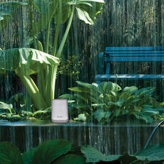 Indoor display of the AcuRite Wireless Rain Gauge showing rainfall totals