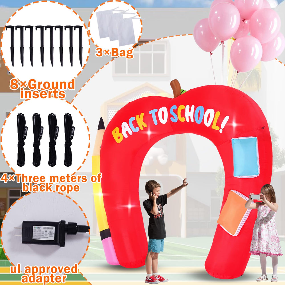 Inflatable arch secured with ground stakes and ropes