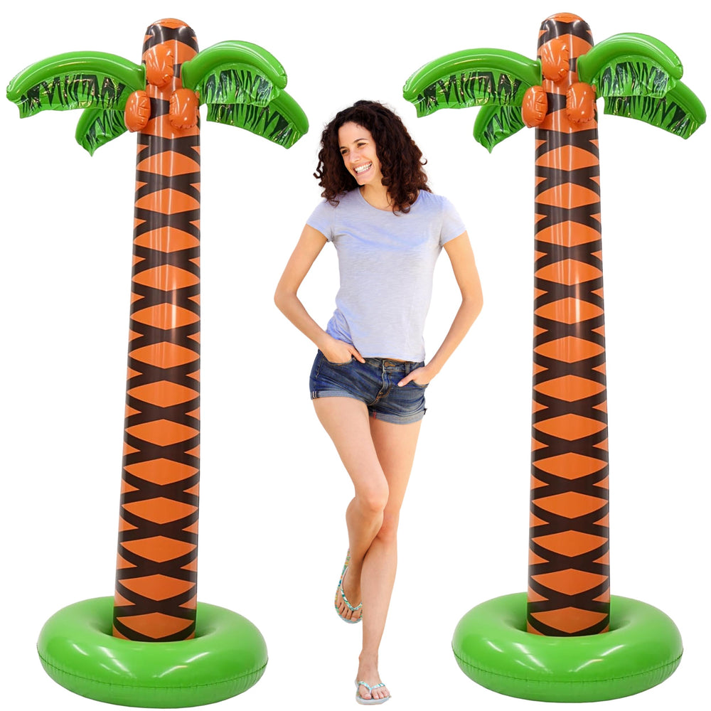 Inflatable palm trees in a backyard setting
