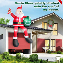 Inflatable Santa Claus sitting on a roof with a gift bag