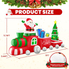 Inflatable Santa train setup in a festive garden during the night