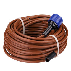 Installation of Raindrip drip irrigation in a vegetable garden