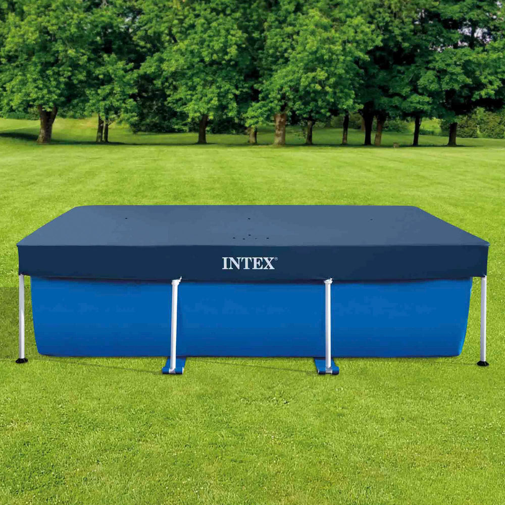 Intex pool cover secured on a pool with rope ties