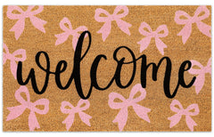 JarThenaAMCS Pink Bow Coir Door Mat front view with welcome text