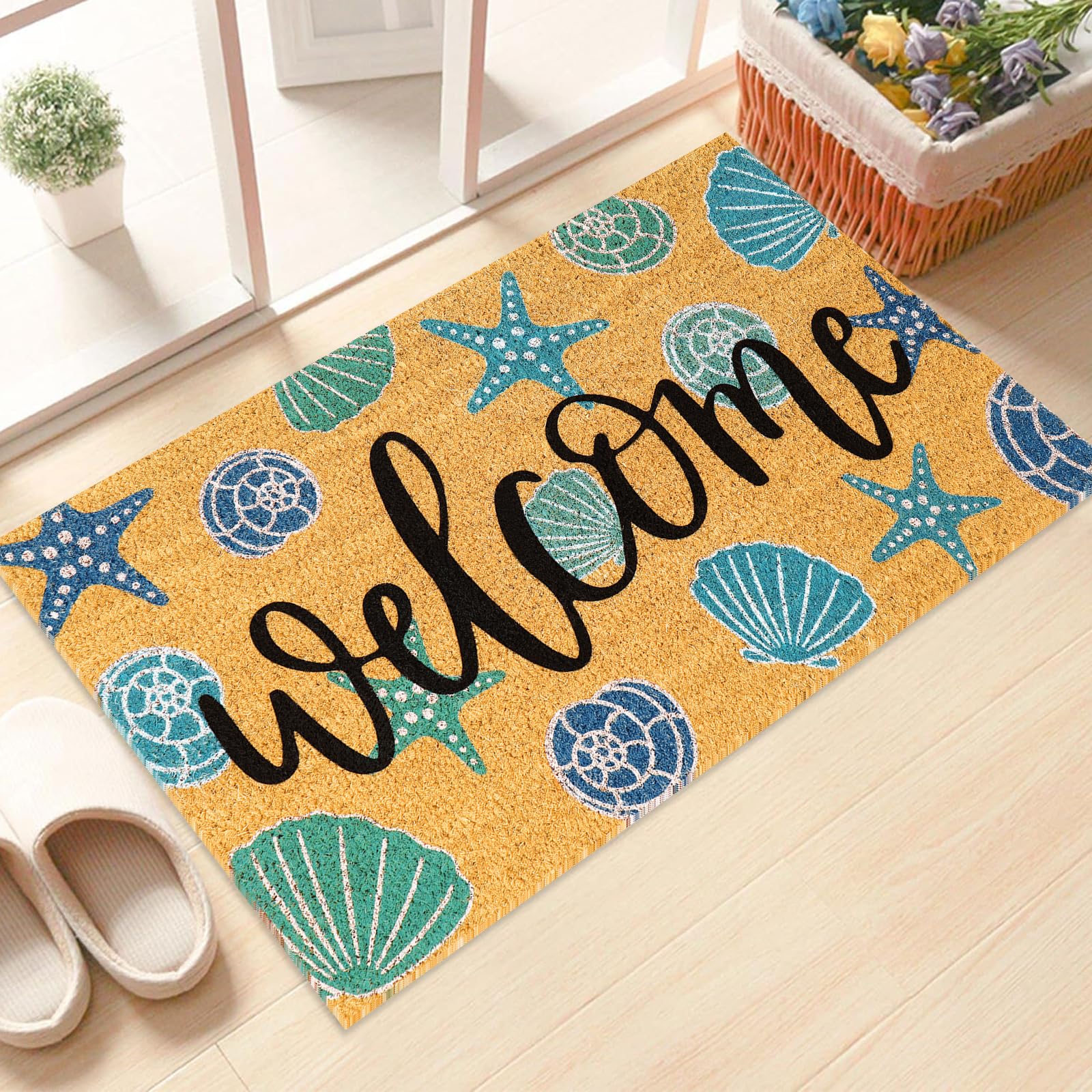 JarThenaAMCS Seashell Coir Door Mat close-up of seashell motifs