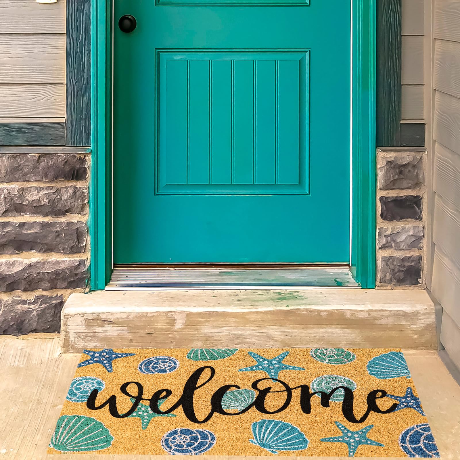 JarThenaAMCS Seashell Coir Door Mat in a home entrance