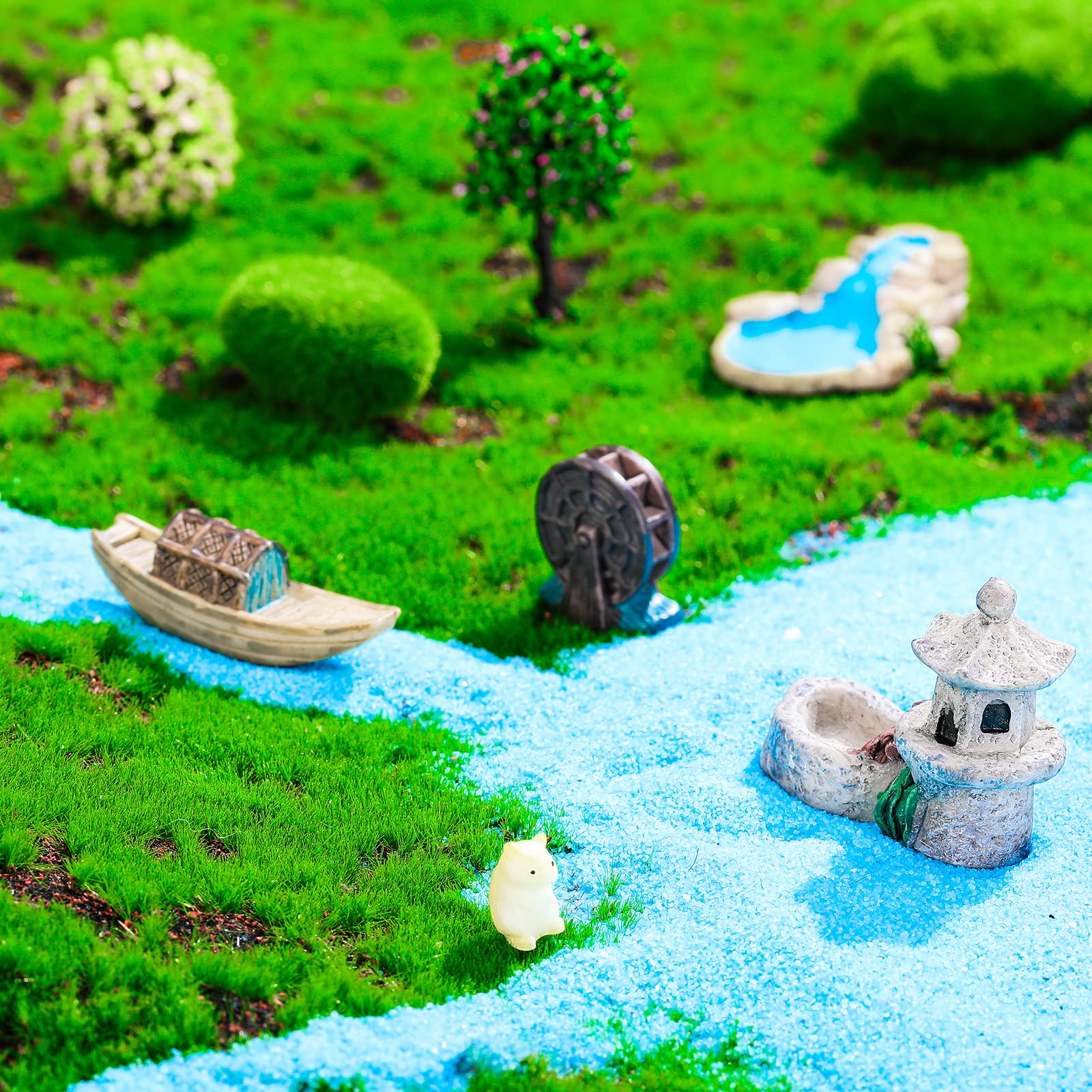 Jetec fairy garden accessories arranged in a miniature garden