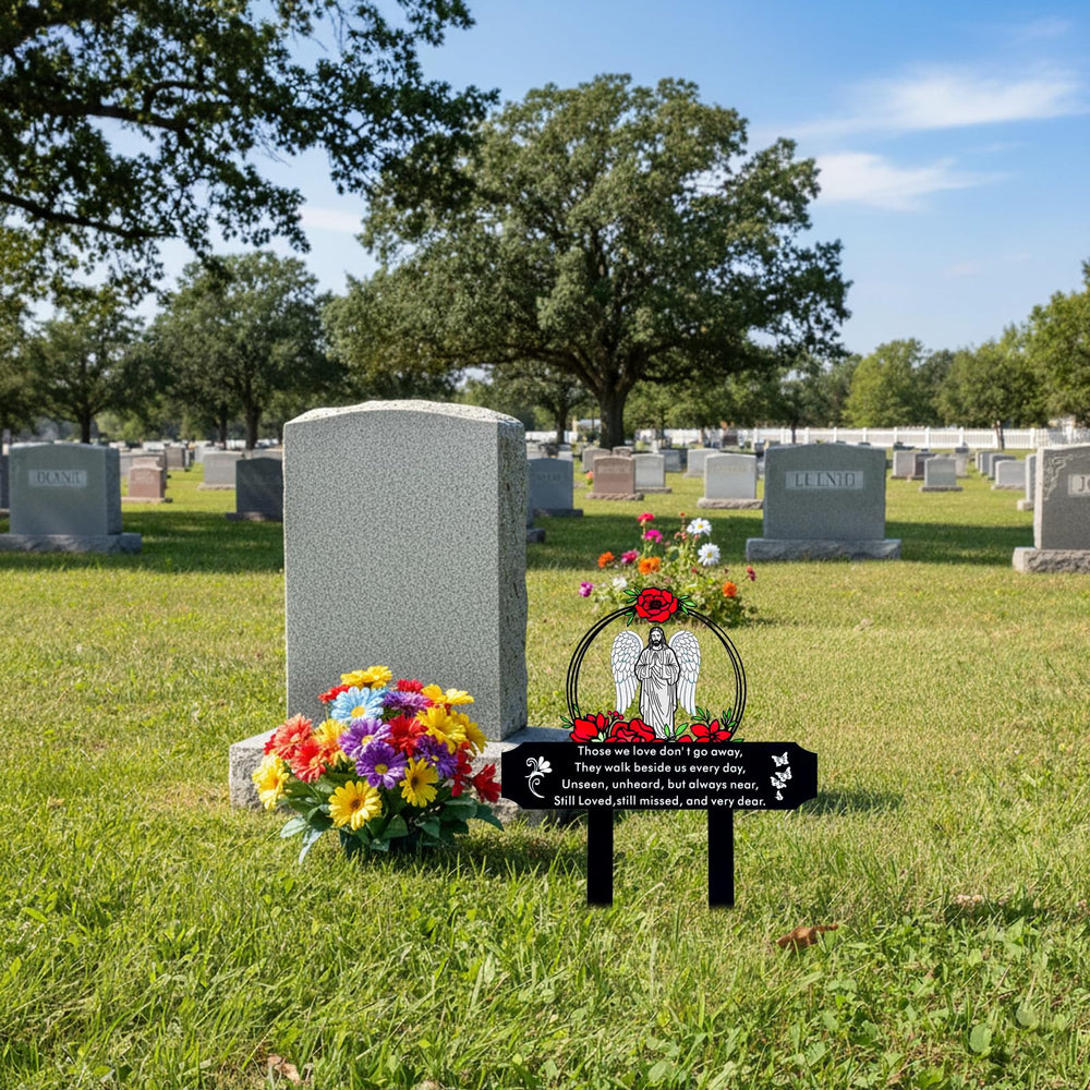 Jiasku Memorial Grave Stake in cemetery with flowers