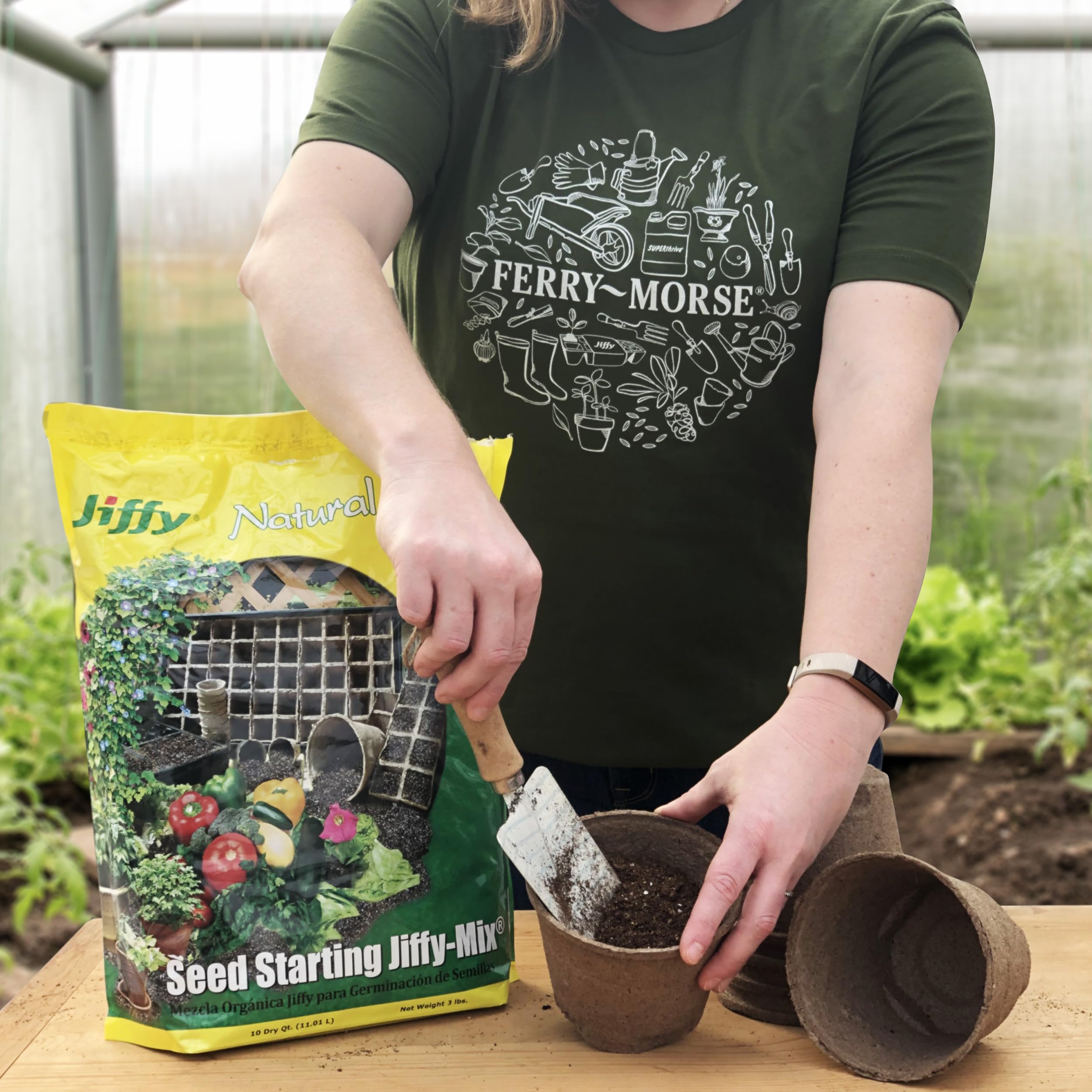 Jiffy Seed Starting Soil Mix in a garden setting with pots