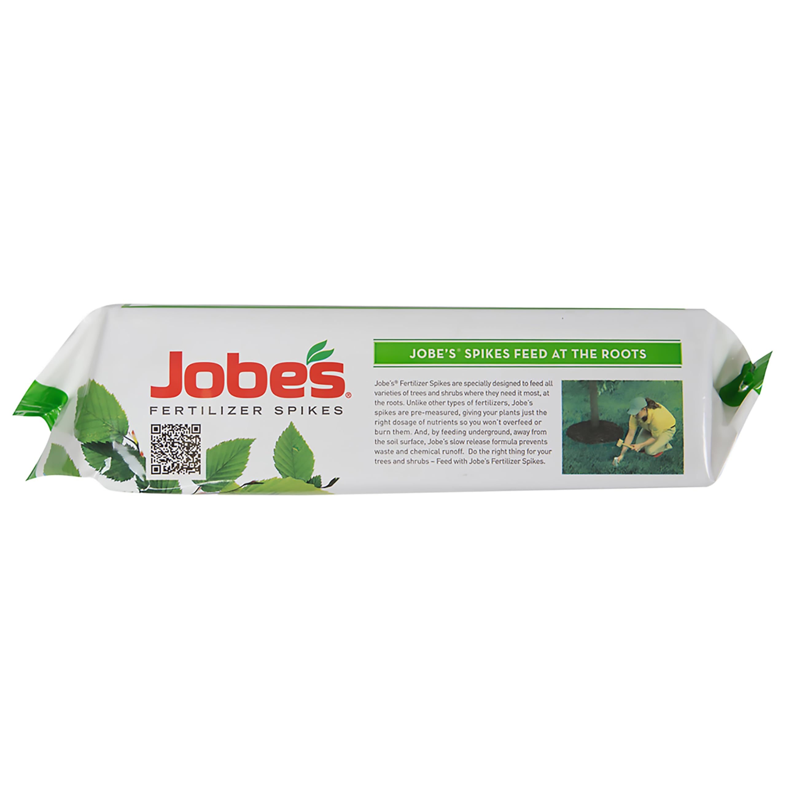 Jobe's fertilizer spikes laid out on a garden surface