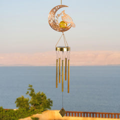 JOBOSI Solar Cardinal Wind Chime illuminated at night