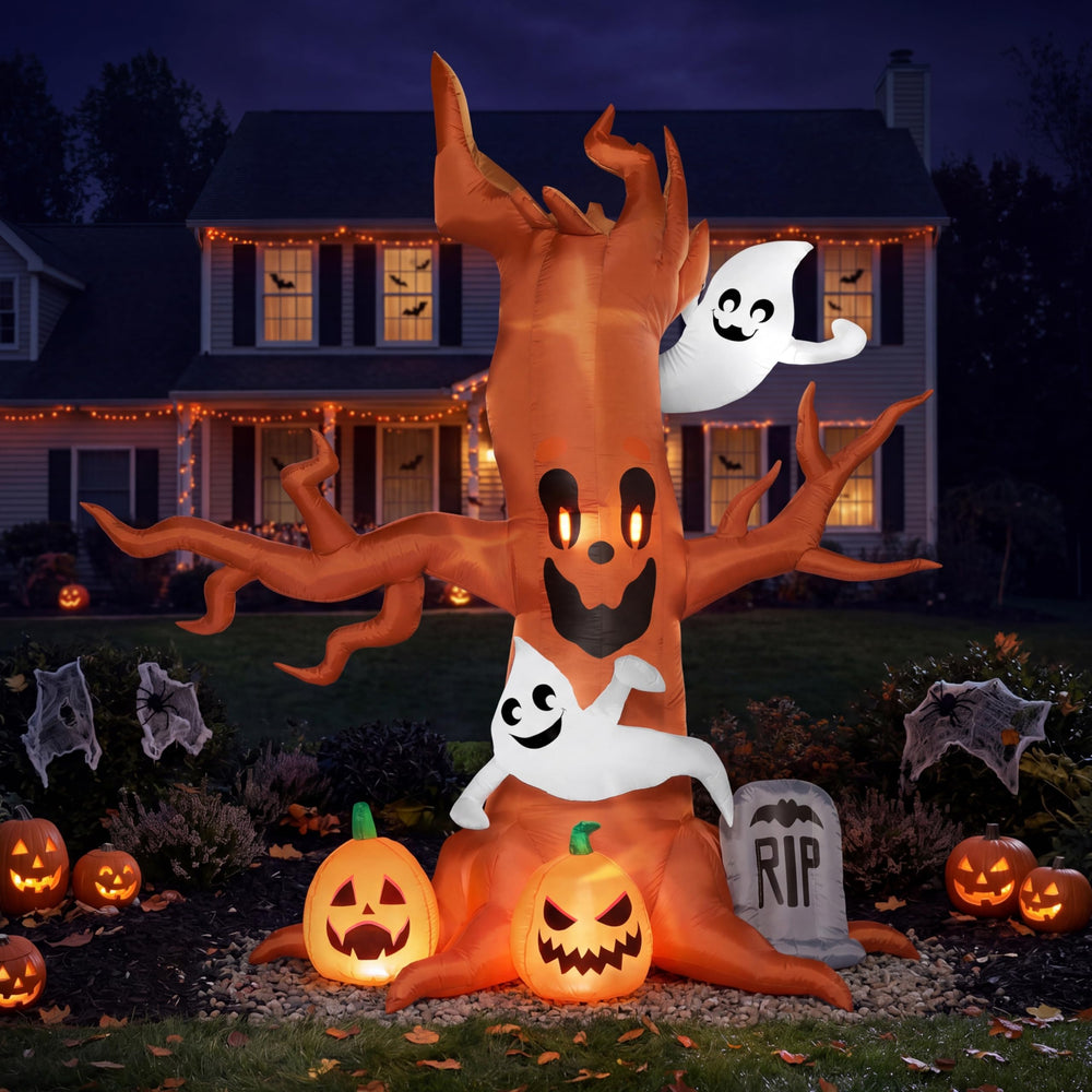 Joiedomi 8FT inflatable scary tree during nighttime display