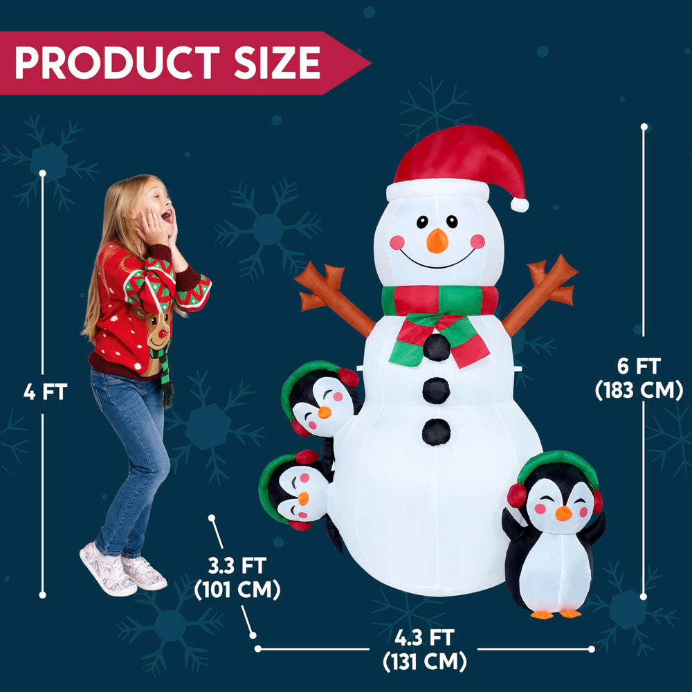 Joiedomi Christmas snowman inflatable during night with lights on