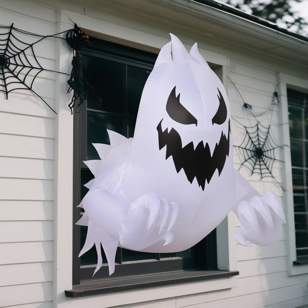 Joiedomi Halloween ghost inflatable at night with lights on