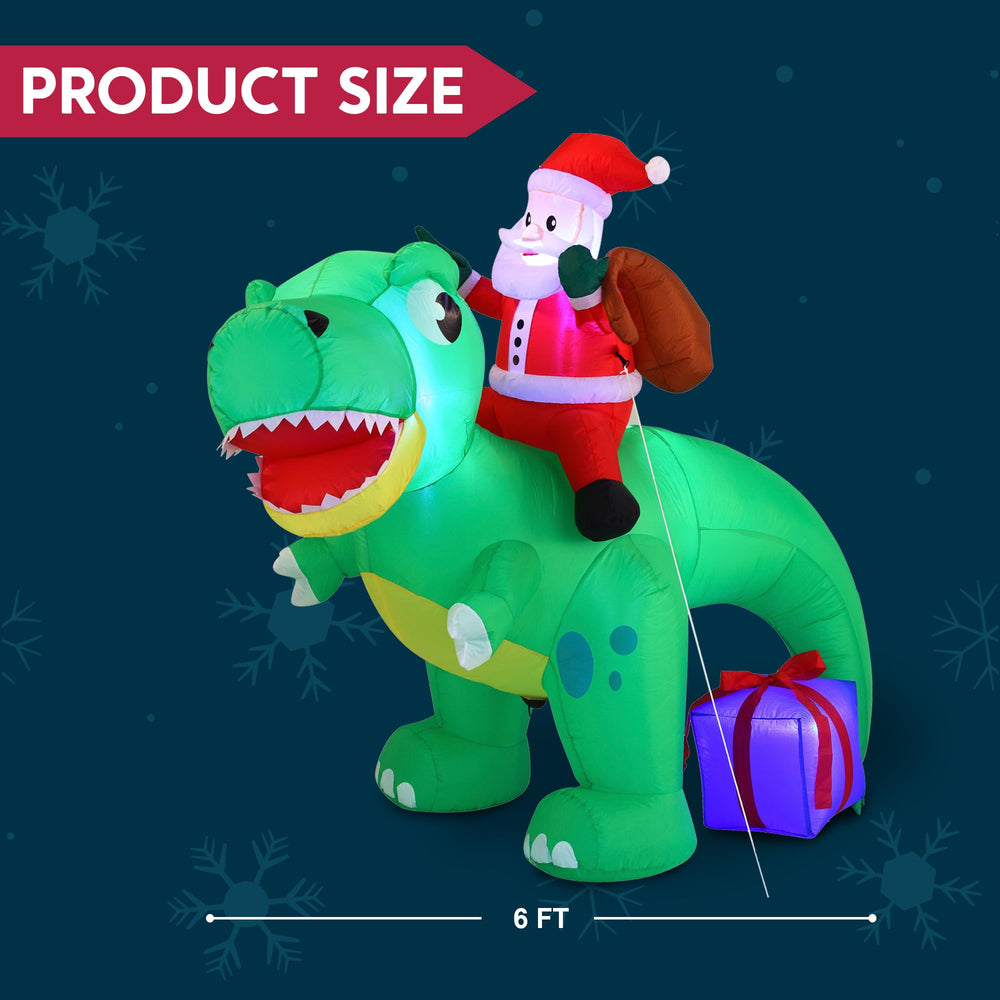 Joiedomi inflatable dinosaur with Santa riding displayed at night