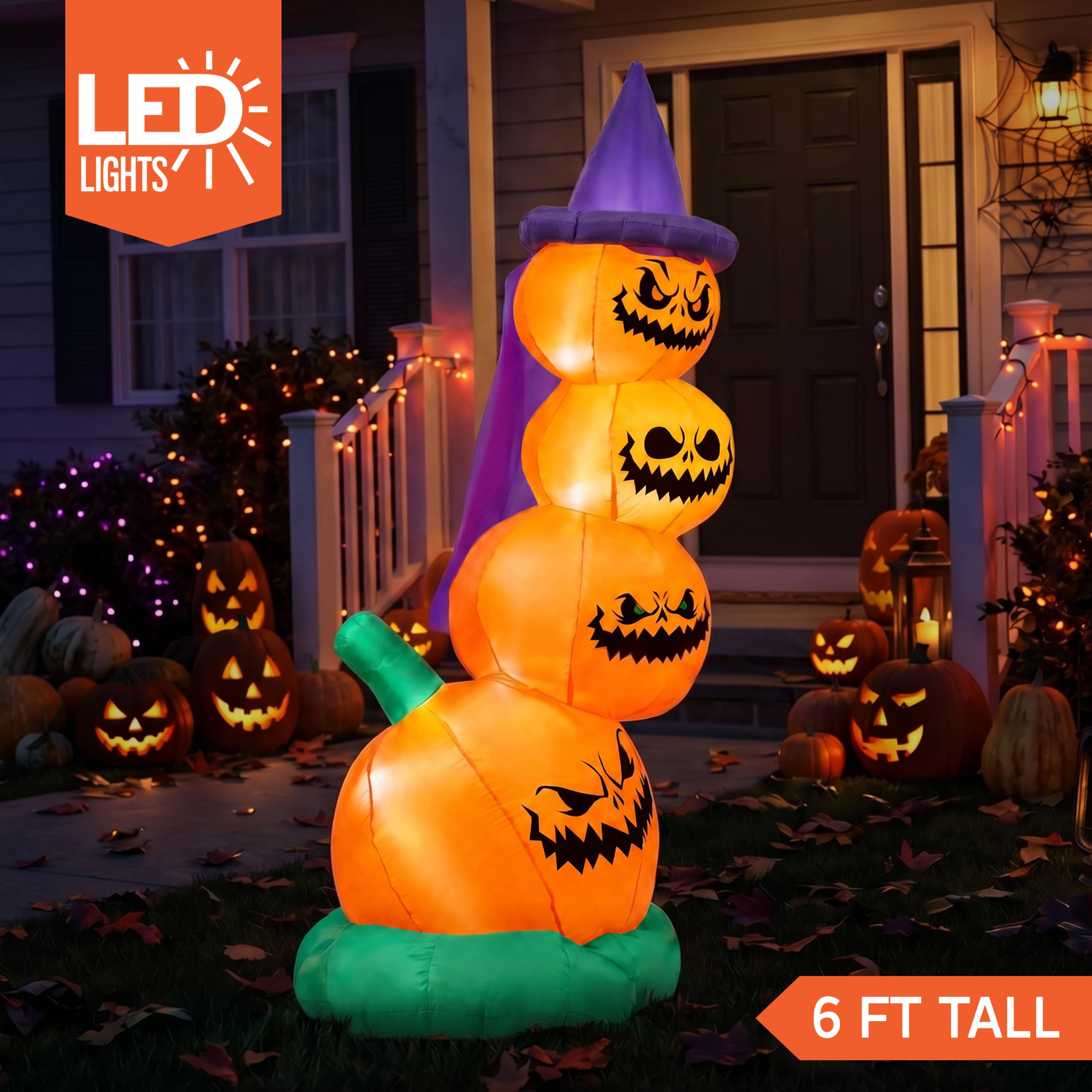Joiedomi inflatable pumpkin with LED lights glowing at night