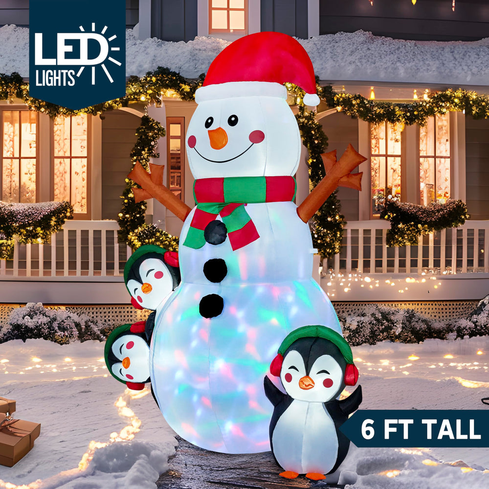 Joiedomi inflatable snowman in a garden setting