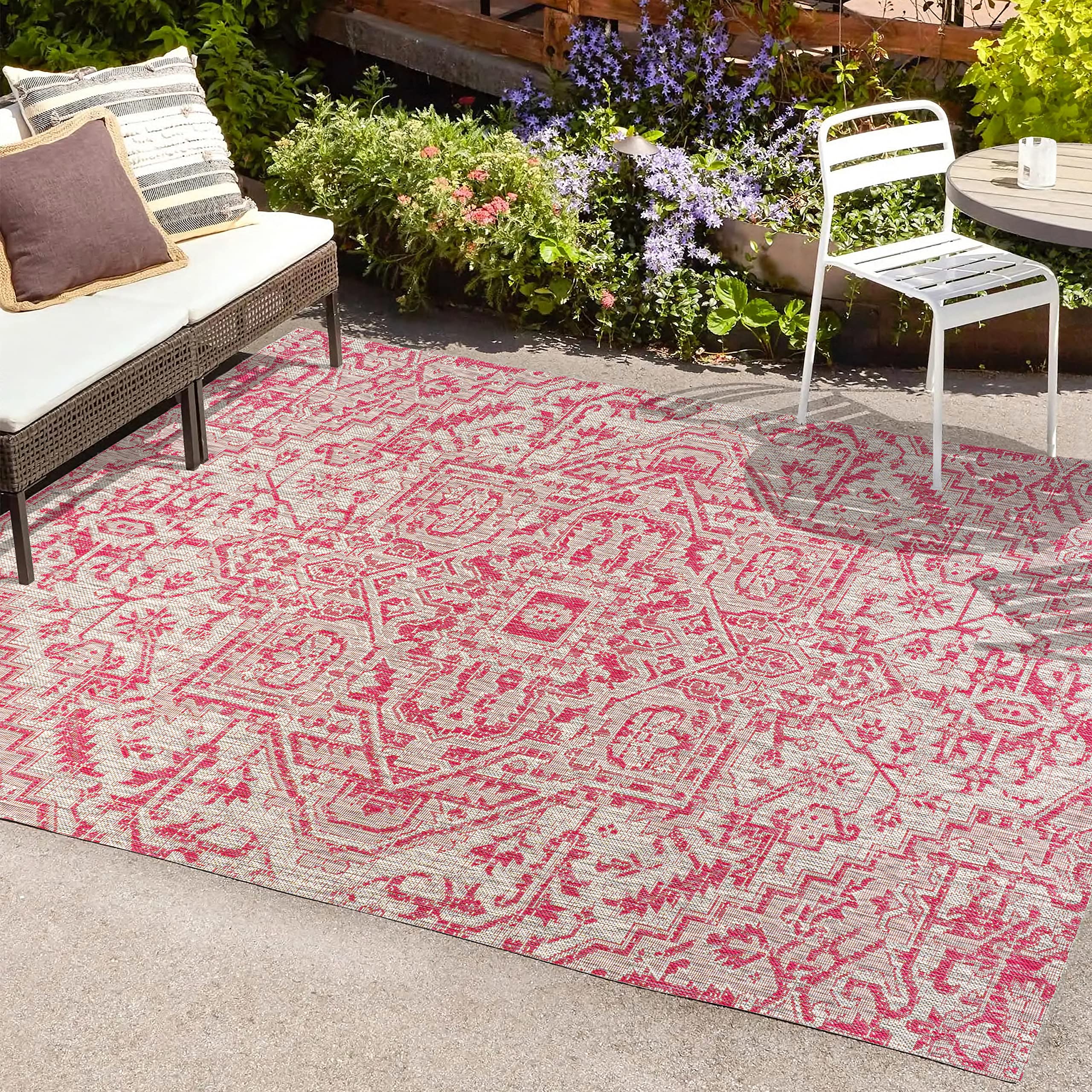 JONATHAN Y Boho Medallion Area Rug displayed on a patio