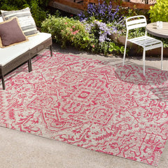 JONATHAN Y Boho Medallion Area Rug displayed on a patio