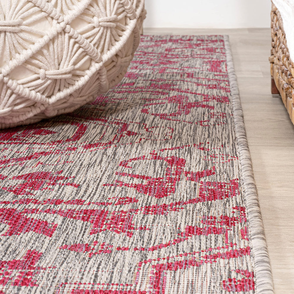 JONATHAN Y Boho Medallion Area Rug on a porch